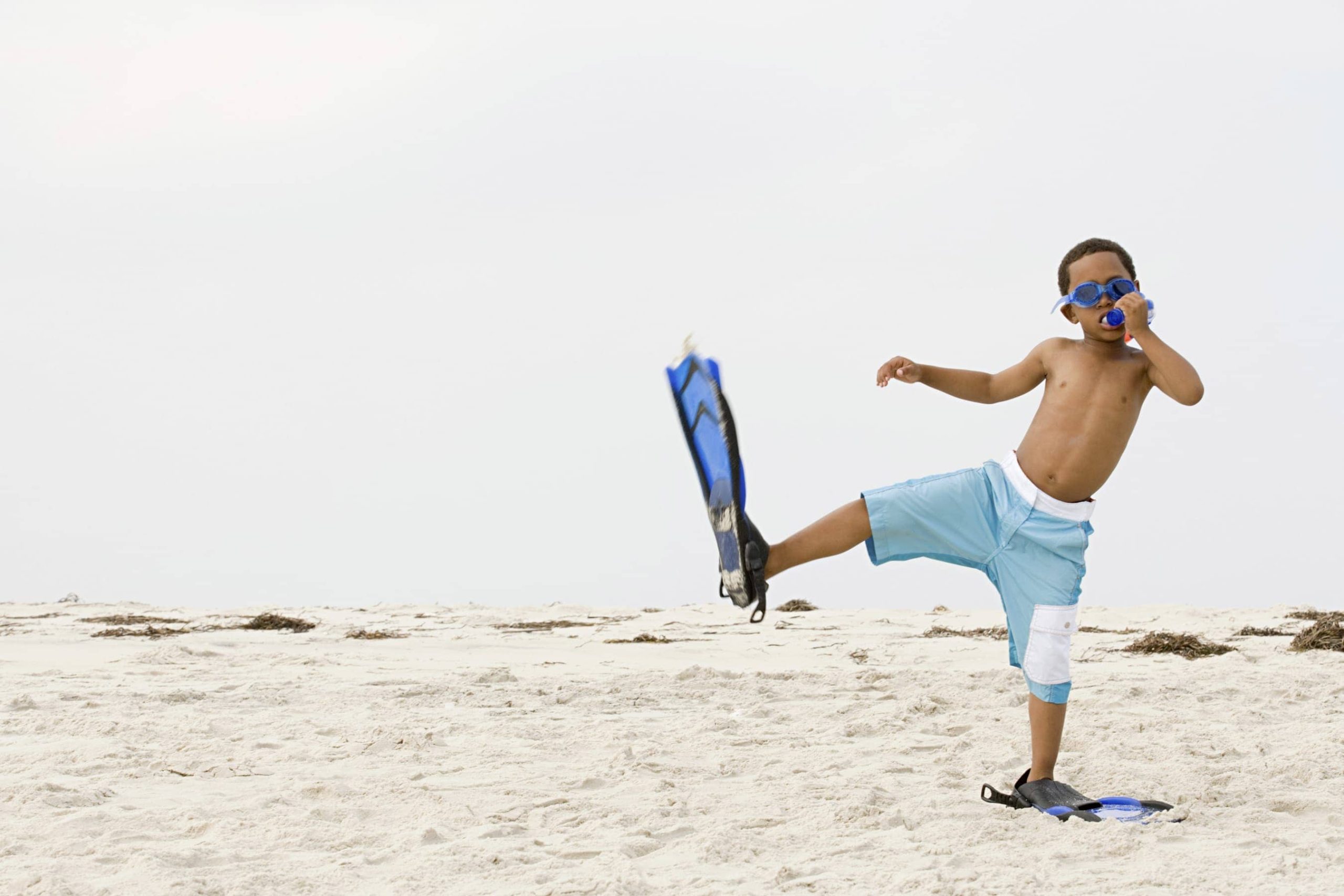 Boy wearing snorkel and flippers