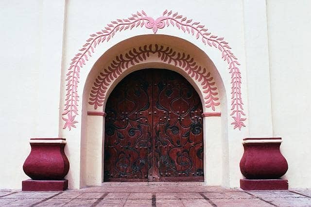 San Cristobal de la Casas, Mexico --- Arched Doorway with Foliate Decoration --- Image by © Royalty-Free/Corbis
